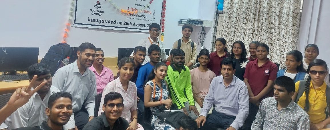 Group Photo of students sitting in a computer lab.