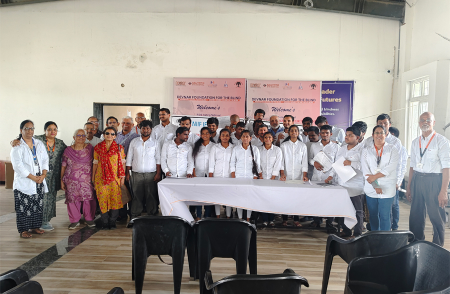 Group photo of HTBF Trustees, Volunteers and Visually Impaired trainees.